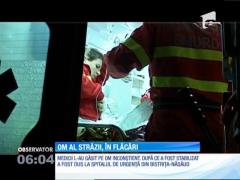 Un om al străzii se zbate între viaţă şi moarte la spital după ce şi-a dat foc!