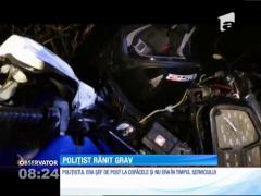 Polițist aflat pe motocicletă, rănit grav