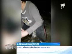 Bunică filmată beată lângă nepotul ei de câţiva anişori!