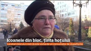 Un ieşean a fost filmat cum fura icoane de pe scara blocului