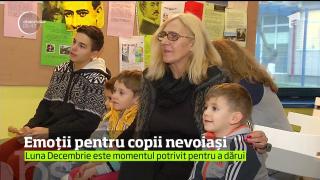 Emoții pentru copiii instituţionalizaţi, care au primit surprize dulci din partea Moşului