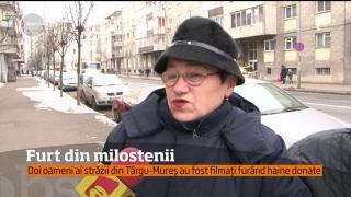 Filmaţi la furat: Doi bărbaţi din Târgu-Mureș au fost surprinşi furând haine donate (VIDEO)