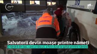 Salvatorii devin moașe printre nămeți