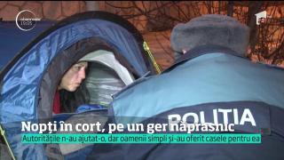 În Drobeta Turnu Severin, la minus 12 grade Celsius, o femeie ruinată de creditul ipotecar doarme în cort, în faţa unei biserici! (VIDEO)
