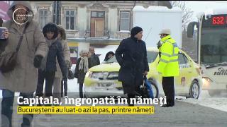 Capitala înzăpezită: Bucureștenii au luat-o azi la pas, printre nămeți (VIDEO)