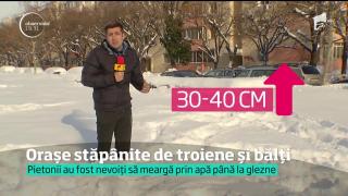 VIDEO Capitala munţilor de zăpadă! Bucureştiul, plin de troiene şi bălţi