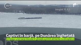 Momente disperate pentru echipajul unei barje ce a rămas blocată în gheaţă, pe Dunăre