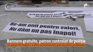 A făcut bannere gratuite pentru protestatari şi s-a trezit cu control de la Poliţia Economică