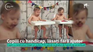 Copiii cu dizabilităţi riscă să rămână fără însoţitor şi doar cu un sfert din indemnizaţie