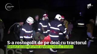 S-a rostogolit cu TRACTORUL de pe deal şi a scăpat ca prin minune cu viaţă!