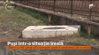 Situaţie HILARĂ, în Hunedoara. Mai mulţi localnici au fost somaţi să se lege la un sistem de canalizare care nu există