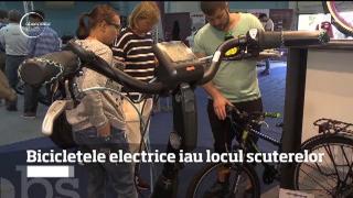 Bicicletele electrice iau locul scuterelor! Pentru a scăpa de nebunia traficului, tot mai mulţi români pedalează