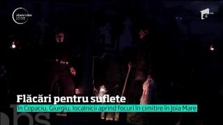 Flăcări pentru suflete. În Copaciu, Giurgiu, localnicii aprind focuri în cimitire, în Joia Mare