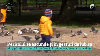 CONTROVERSĂ! Ce spun psihologii despre pupatul copiilor noştri pe gura