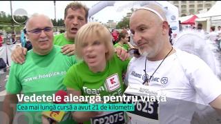 Curse pentru scopuri umanitare, la Semimaratonul Bucureştiului. 15 MII de oameni au luat startul!