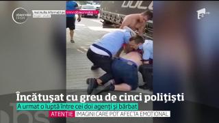 Bătaie la Pitești, între un șofer de TIR și CINCI POLIȚIȘTI. Bărbatul s-a bătut cu ei până a leșinat (VIDEO)