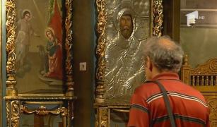 Preotul din Vedea a plecat să împărtăşească bătrânii, dar a căzut răpus de caniculă, pe stradă