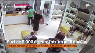 Furt de 6.000 de euro, filmat într-un mall din Cluj! Care a fost strategia hoaţei pentru a da lovitura!