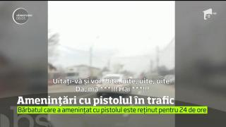 Incident şocant în trafic! Un conducător auto este ameninţat cu pistolul de un alt şofer