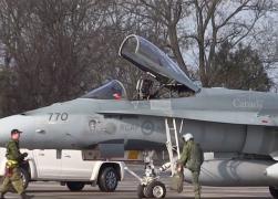 Exerciţiu spectaculos de poliţie aeriană, la care au luat parte piloţi români şi canadieni