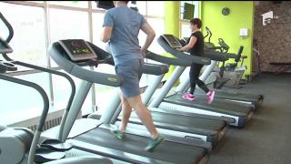 Românii scapă de kilogramele puse de sărbători la sala de fitness