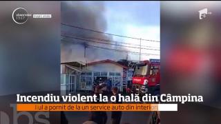 Incendiu violent la un service auto din Câmpina. Bateriile mai multor maşini au explodat (Video)