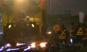 Șinele de tren din New York, incendiate pentru a le feri de îngheț