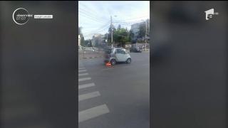 Panică într-o intersecţie din Suceava, după ce un autoturism a luat foc chiar la semafor