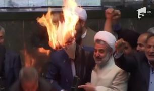 Parlamentarii iranieni au dat foc steagului american, după ce Donald Trump a anunţat că renunţă la acordul nuclear cu Iran