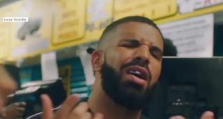 Artistul Drake și-a montat fațete dentare din metale prețioase