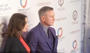 Daniel Craig și Rachel Weisz şi-au făcut apariţia, pentru prima dată, împreună cu bebeluşul lor