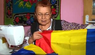 Steagurile româneşti, cusute de o femeie din Argeş, ajung în toată lumea (Video)