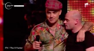 Robbie Williams va rămâne în juriul X Factor doar dacă i se va mări salariul