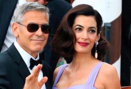 Un student la drept a plătit 8 mii de dolari pentru un prânz cu soţia lui George Clooney