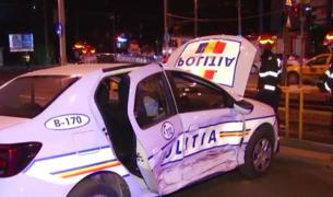 Maşină a poliţiei, izbită în plin de un alt autoturism în Bucureşti. Doi agenţi au ajuns la spital (Video)