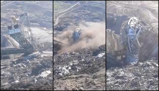 Momentul în care un excavator gigant se prăbuşeşte în mina de la Alunu. Imagini dramatice la Vâlcea (Video)