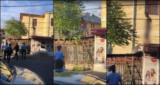 Un tânăr s-a cocoţat complet dezbrăcat pe un magazin, lângă Parchetul de pe lângă Curtea de Apel Ploieşti (Video)