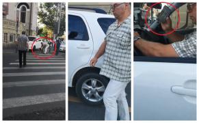 Bărbat cu legitimaţie "Misiune specială" de rupt stâlpi şi parcat pe trotuar, filmat în Bucureşti (Video)