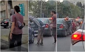 Bătaie cruntă în trafic, la Bucureşti. Doi tineri lovesc o persoană, apoi se urcă în maşina acesteia (Video)