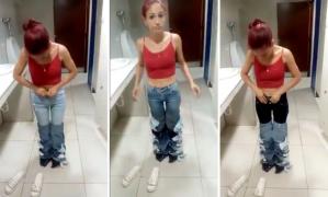 Hoață prinsă când era îmbrăcată cu 8 perechi de jeans pe care le-a furat (Video)