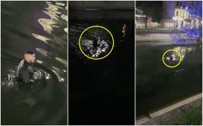 Primele imagini cu şoferul BMW-ului X6 în râul Dâmboviţa, unde s-a scufundat ca să se ascundă de poliţişti (Video)