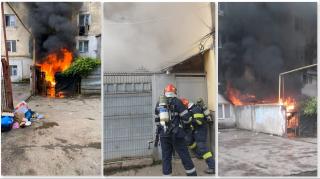 Incendiu în Iași la o magazie unde locuiau oameni ai străzii - video