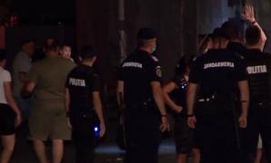 Bătaie cu pumni şi picioare între vecini, după ce s-au îmbătat în faţa blocului, în Capitală