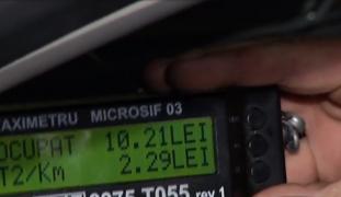 Taximetriști prinși cu "maimuța" în București, după o razie a polițiștilor