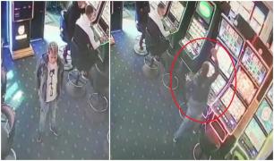 Tânăr din Rovinari filmat când distruge aparatele de păcănele, alți clienți privesc împietriți scena [Video]