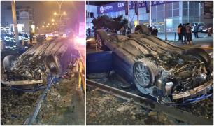 Un şofer băut s-a răsturnat cu un Audi pe linia de tramvai, în Bucureşti. Maşina e daună totală