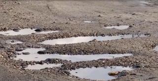 Drumul Nordului din Maramureş, transformat în drumul gropilor