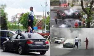 BMW în flăcări pe Şoseaua Fundeni. Şoferul a refuzat să iasă din maşină, apoi s-a dezbrăcat şi a luat-o la fugă, spun martorii