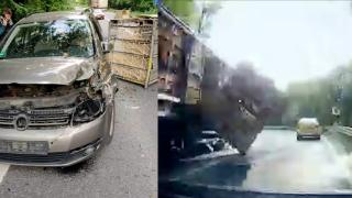 Sperietură teribilă pentru un șofer. Încărcătura unui camion s-a desprins în mers și a căzut pe mașina lui. VIDEO