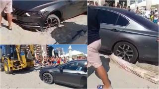 Şoferul care s-a parcat pe plaja din Saturn a rămas împotmolit. Cum a fost scos din nisip cu excavatorul. "Cearşaful meu!"